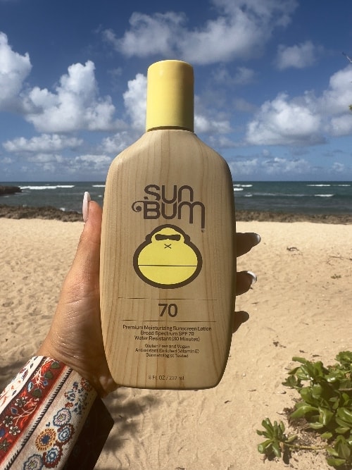 Sun Bum Sunscreen at beach in Oahu